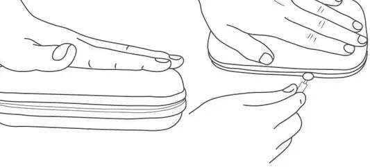 Hands pressing and zipping the Eurolabx travel case closed
